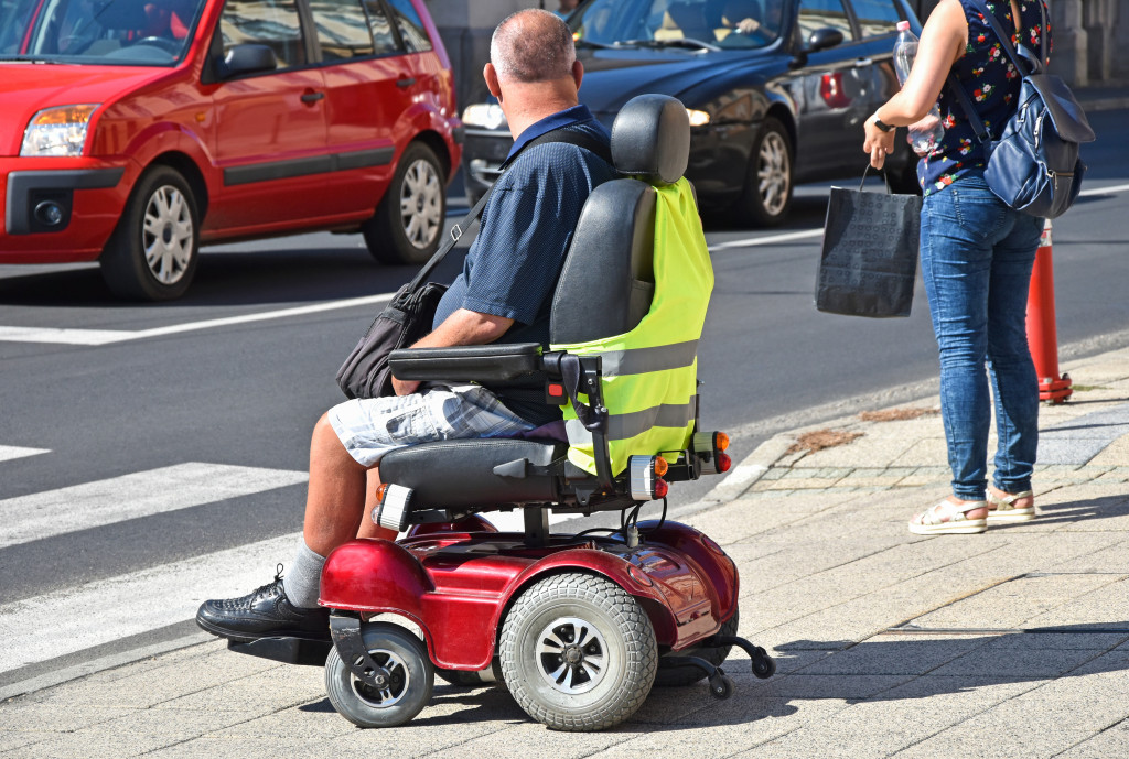 senior in electric wheelchair